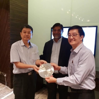 MOMG presented a token to Mr GC Tan, founding & Exco member of MOMG, July 4, 2018